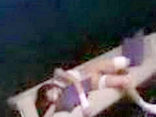 Asian goddess with a sweet smile and a wounded heart, moans in ecstasy